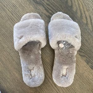 Brand new ugh slipper. Still in box. Never worn.